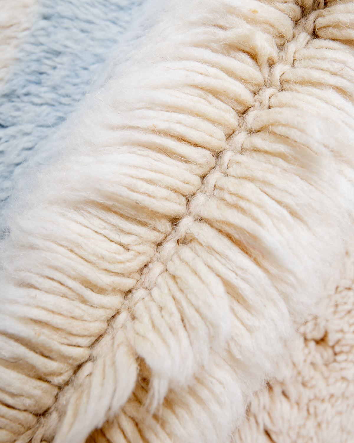 Modern, designer, handcrafted 100% sheep’s wool Berber rug from Morocco. Beni M’rirt carpet with beautiful colours and patterns and fluffy wool texture.